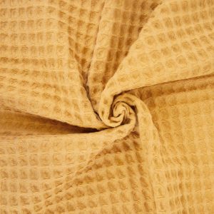 Met zijn rustieke en natuurlijke kleuren is de Big Waffle stof perfect voor een casual sportieve stijl. Ideaal voor het maken van comfortabele en moderne kleding