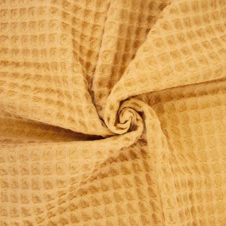 Met zijn rustieke en natuurlijke kleuren is de Big Waffle stof perfect voor een casual sportieve stijl. Ideaal voor het maken van comfortabele en moderne kleding