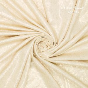 Deze geweven stof met gouden glitter foil wordt gebruikt voor Fibre Mood modellen Mirri en Tesni en is duurzaam gemaakt volgens de OEKO-TEX Standard 100.