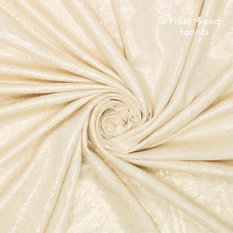 Deze geweven stof met gouden glitter foil wordt gebruikt voor Fibre Mood modellen Mirri en Tesni en is duurzaam gemaakt volgens de OEKO-TEX Standard 100.