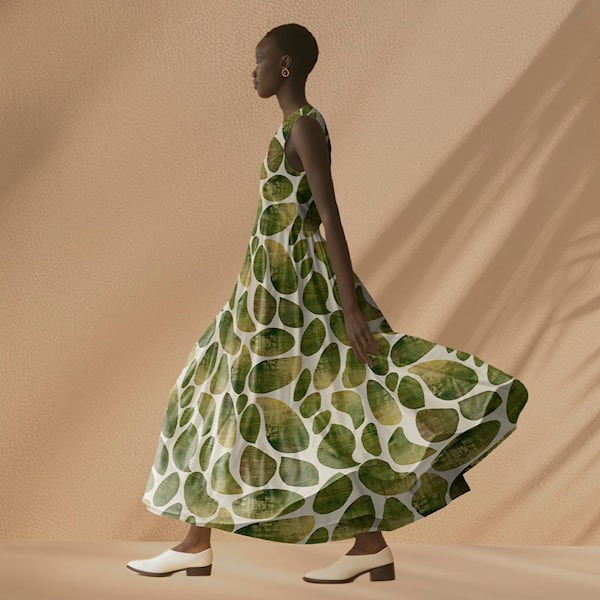 Een zachte, soepel vallende viscose met een organisch abstract dessin in warme groentinten. Perfect voor luchtige blouses, jurken, rokken en zomerse kleding