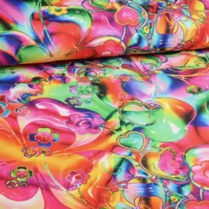 Terlenka stof met multicolor hartenprint. Soepel, kreukvrij en kleurecht polyester. Ideaal voor kleding en decoratie. Direct online verkrijgbaar.