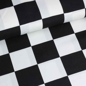 Terlenka stof met finish vlag print zwart-wit. Soepel, slijtvast en onderhoudsvriendelijk. Perfect voor kleding en accessoires. Bestel online.