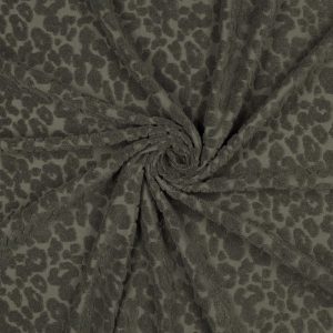 Zachte katoenen badstof met gebreid dierenhuidpatroon. Rekbaar, absorberend en ideaal voor comfortabele kleding en baby- en kinderkleding.