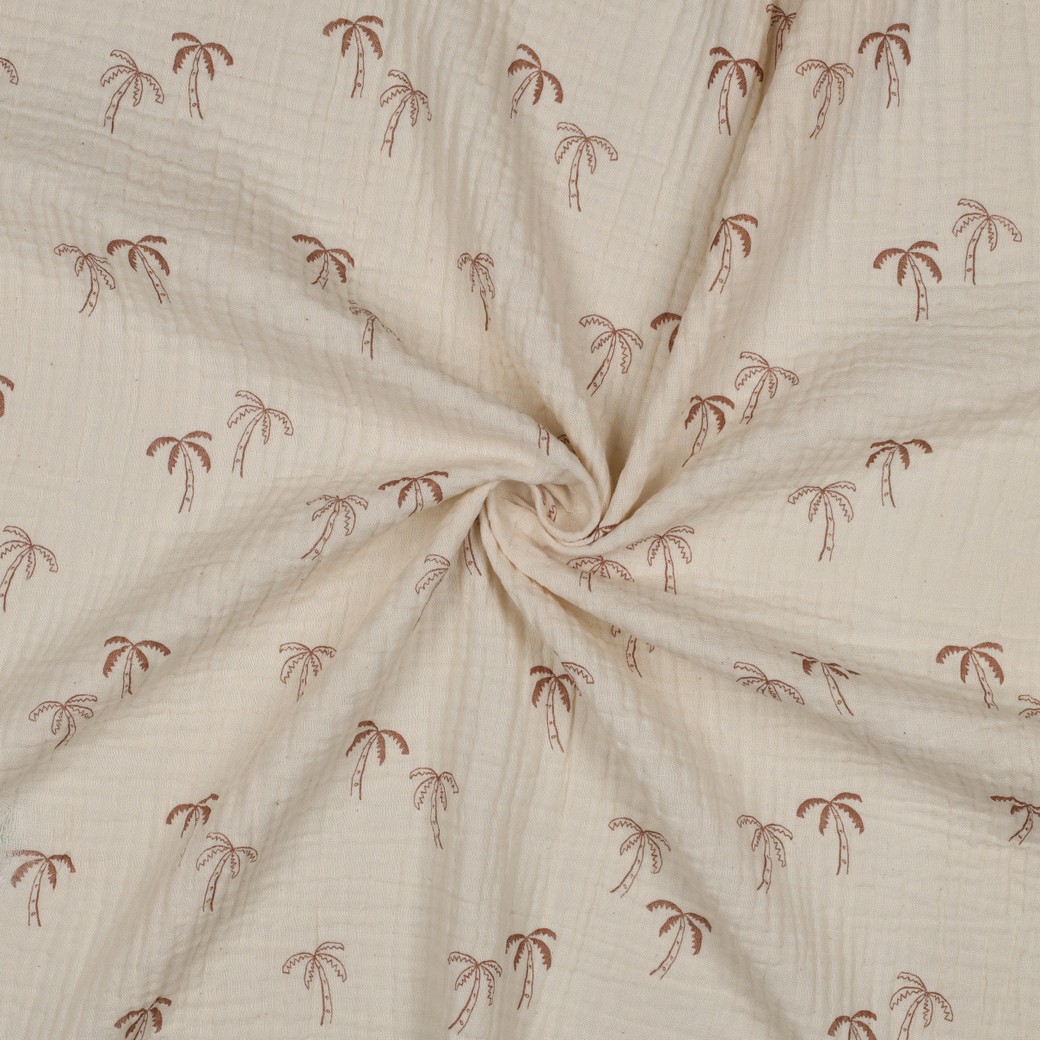 Duurzame double gauze van biologisch katoen met palmboomprint. GOTS en OEKO-TEX gecertificeerd, zacht, ademend en ideaal voor kleding en babyproducten.