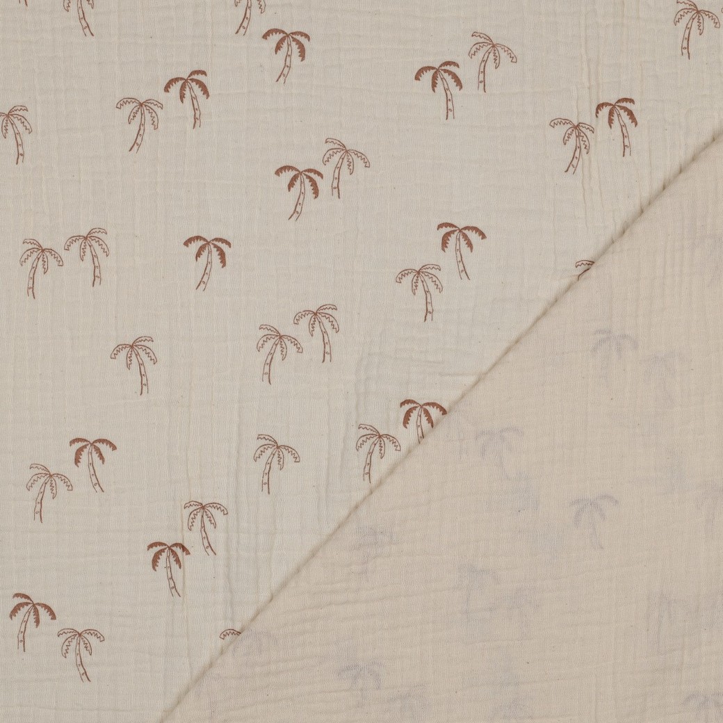 Duurzame double gauze van biologisch katoen met palmboomprint. GOTS en OEKO-TEX gecertificeerd, zacht, ademend en ideaal voor kleding en babyproducten.