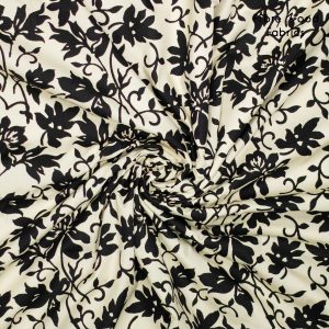 Stof voor Fibre Mood model Jax kopen? Kies deze poplin katoen met bloempatroon zwart met OEKO-TEX Standard 100 certificering.