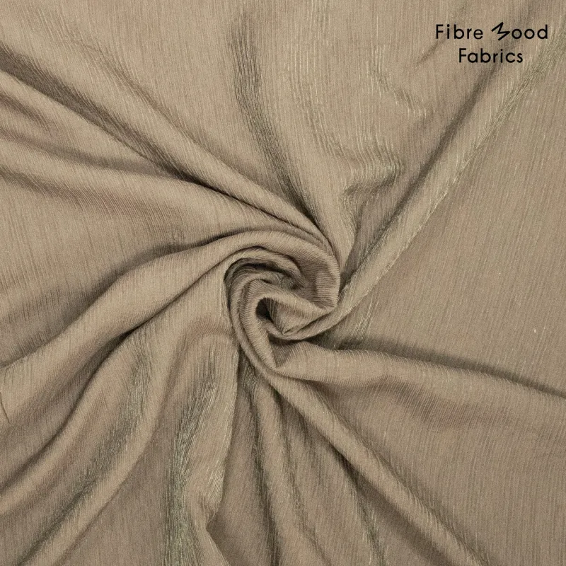 Ontdek Fibre Mood FM792025-321 licht beige. Een soepel vallende geweven stof van Tencel™, nylon, polyester en wol. Ideaal voor blouses, jurken, rokken en broeken.