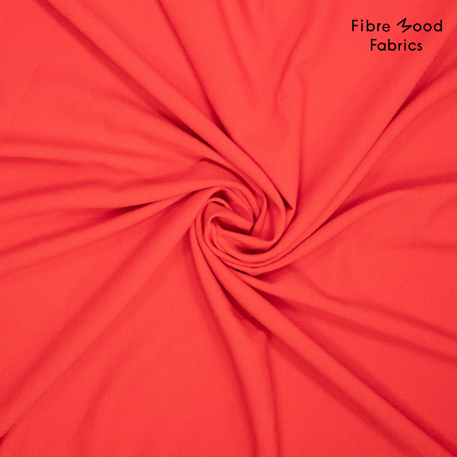 Deze elastische polyester-viscose crepé in de kleur rood wordt gebruikt voor Fibre Mood model Yuna en is duurzaam gemaakt volgens de OEKO-TEX Standard 100.
