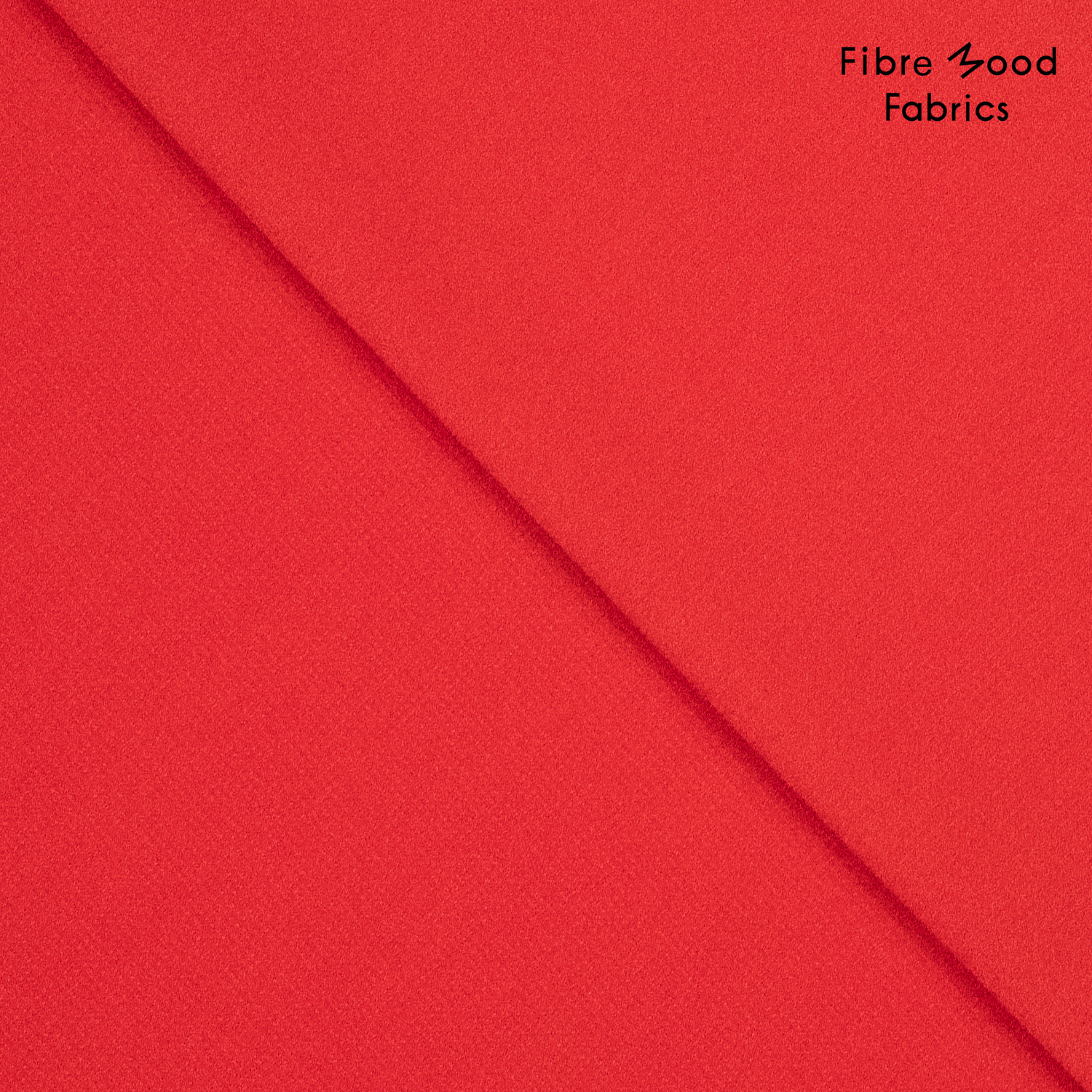 Deze elastische polyester-viscose crepé in de kleur rood wordt gebruikt voor Fibre Mood model Yuna en is duurzaam gemaakt volgens de OEKO-TEX Standard 100.